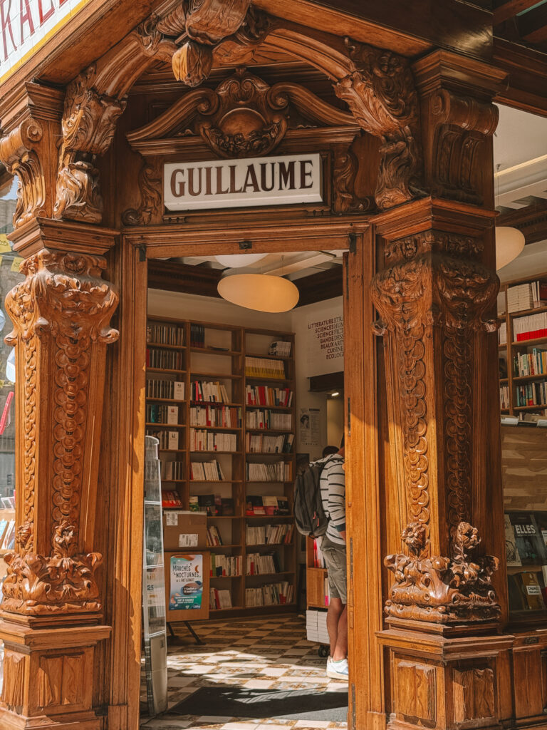 Close-up of bookshelves inside a bookshop in Caen France