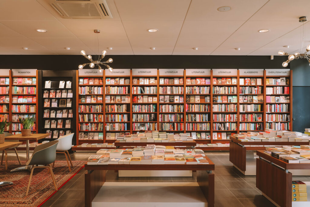 Browsing shelves in a bookstore and choosing what to read