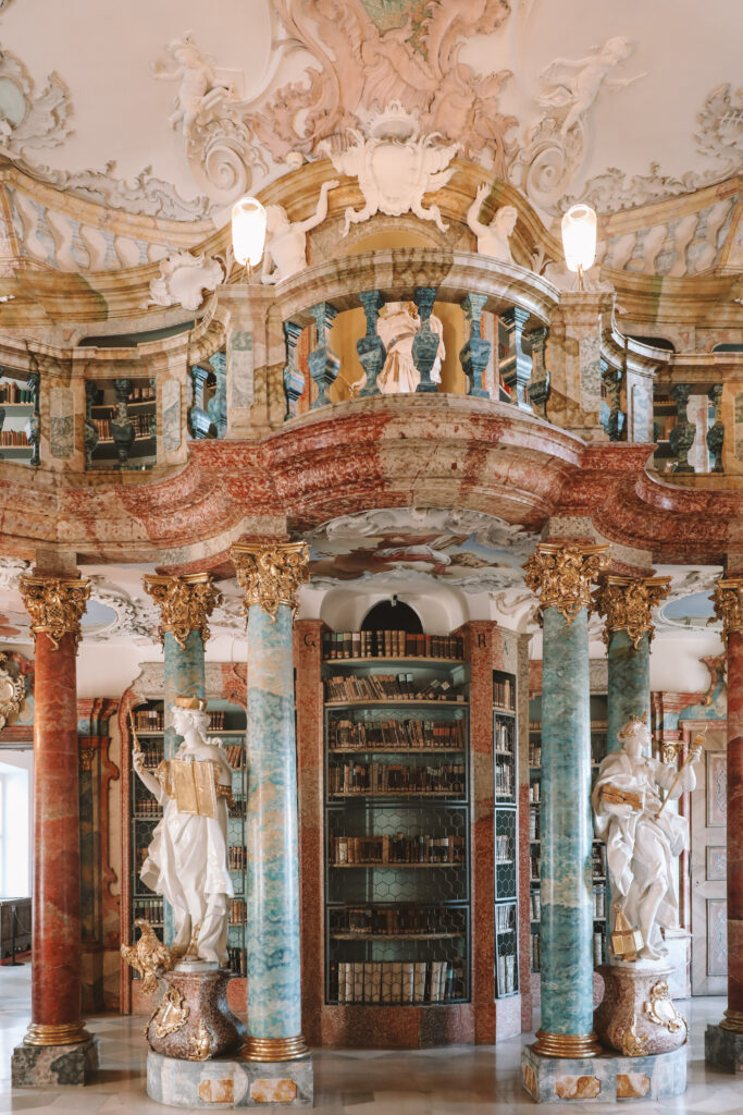 Rococo details inside Wiblingen Abbey Library with sculptures and pastel tones