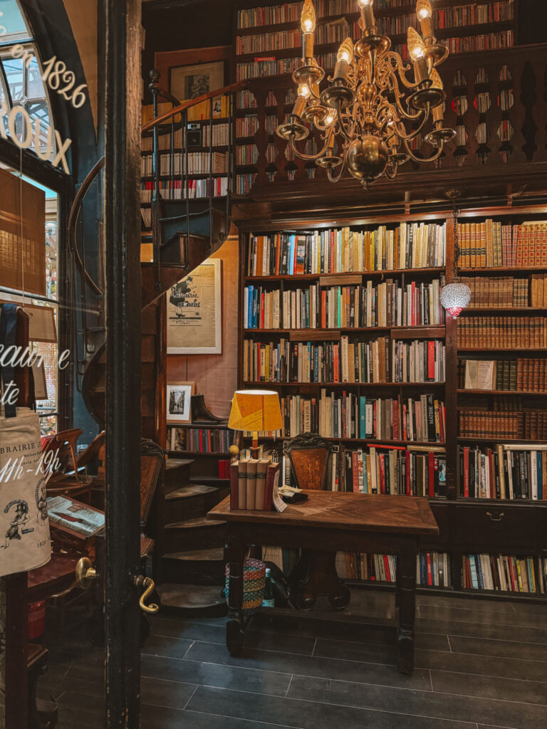 Independent bookstore with floor-to-ceiling bookshelves and a cozy reading atmosphere
