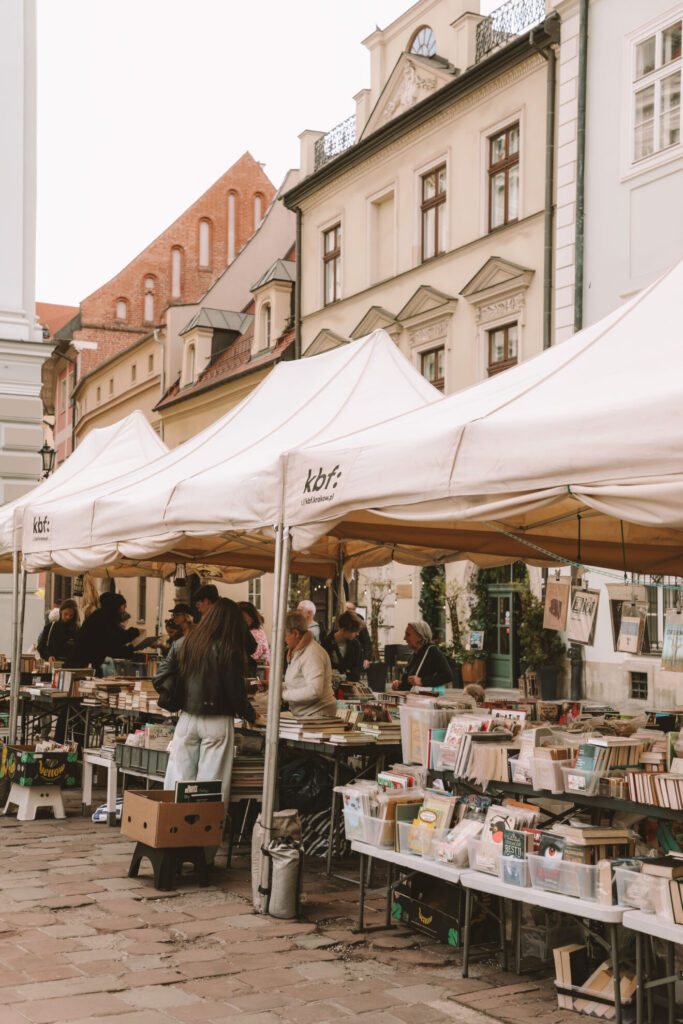 Visitors browsing books at Krakowski Kiermasz Książki