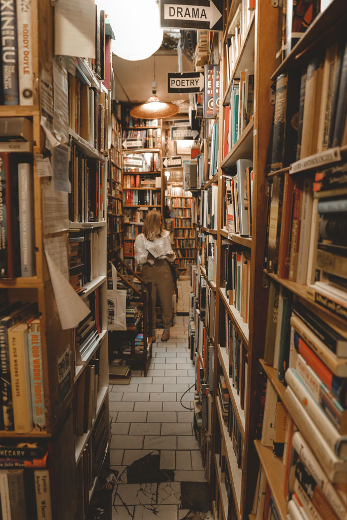 Bookshelves inside The Abbey Bookshop in Paris